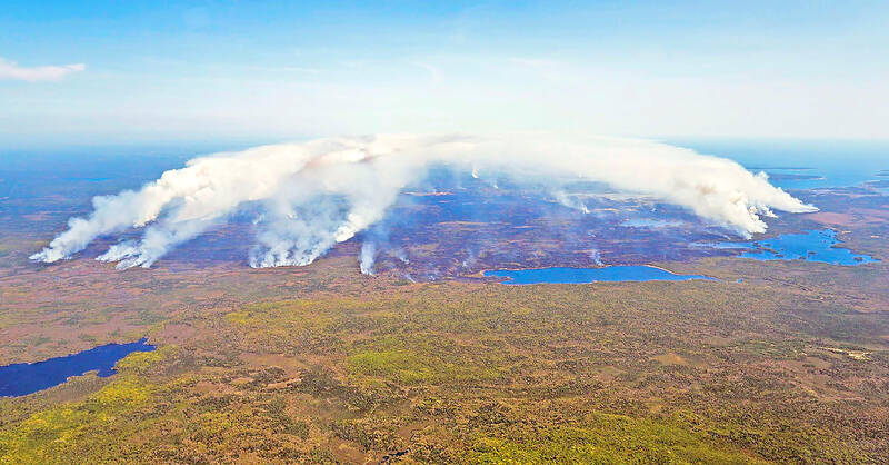 Nova Scotia wildfires grow, prompt US air quality warnings - Taipei Times