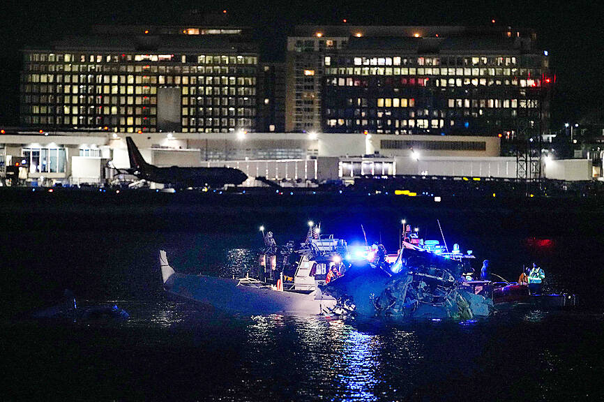 US plane with 64 onboard, chopper collide - Taipei Times