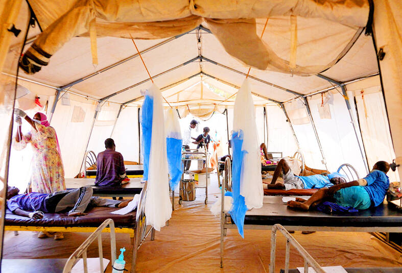 Sudan’s exhausted doctors treat their fellow survivors