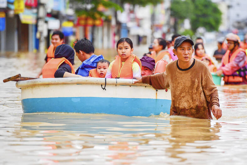 Tropical storm kills three as it approaches Vietnam