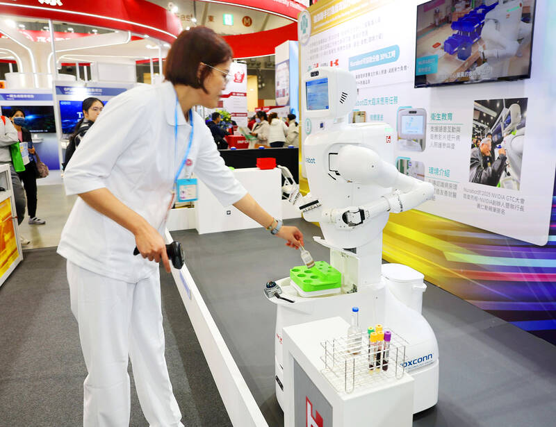 taipeitimes.com - 台北時報 - Hon Hai-TVGH codeveloped scrub robot could be launched by spring next year