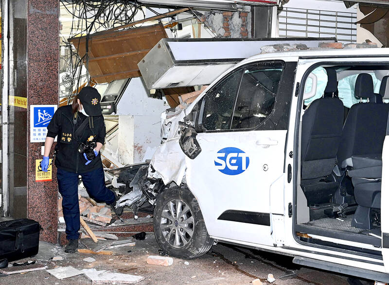 TV news van crashes into Taipei bank, injuring 10