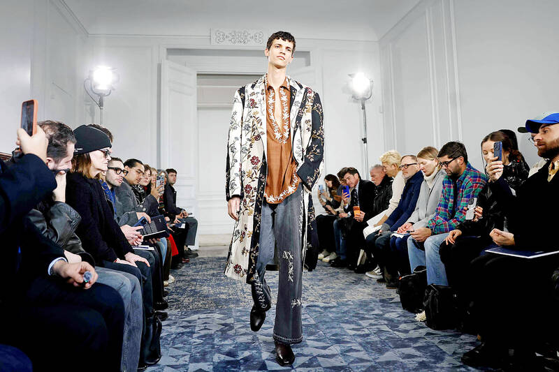 Men’s fashion turns away from traditional neutral to embroidery