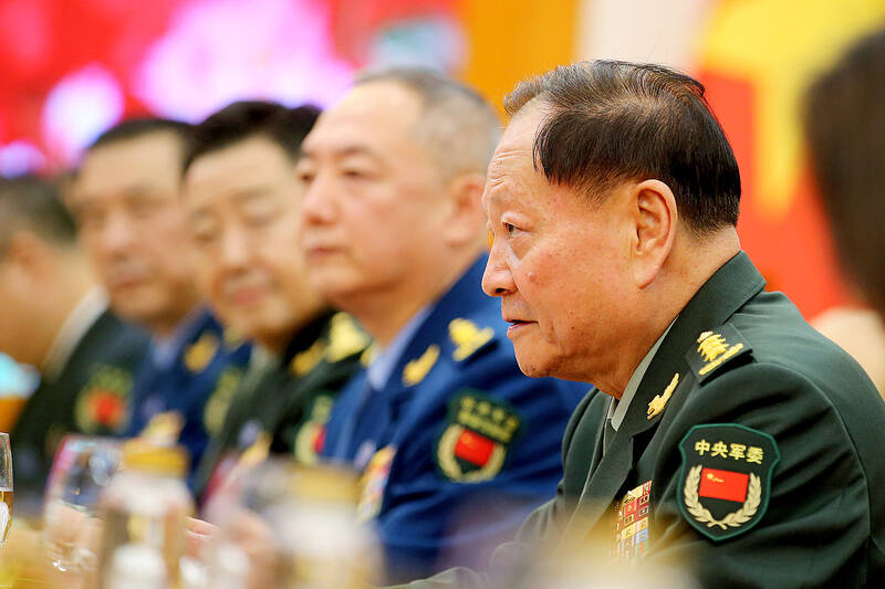 Chinese purge might slow PLA, experts say