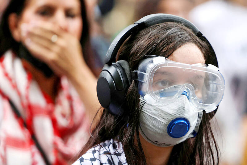 Australia urges calm after rally clash