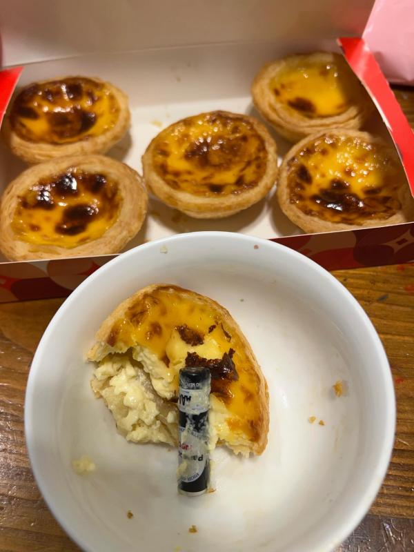 KFC faces fine after battery found in egg tart