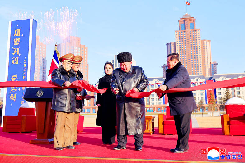 Kim unveils homes for families of troops killed supporting Russia