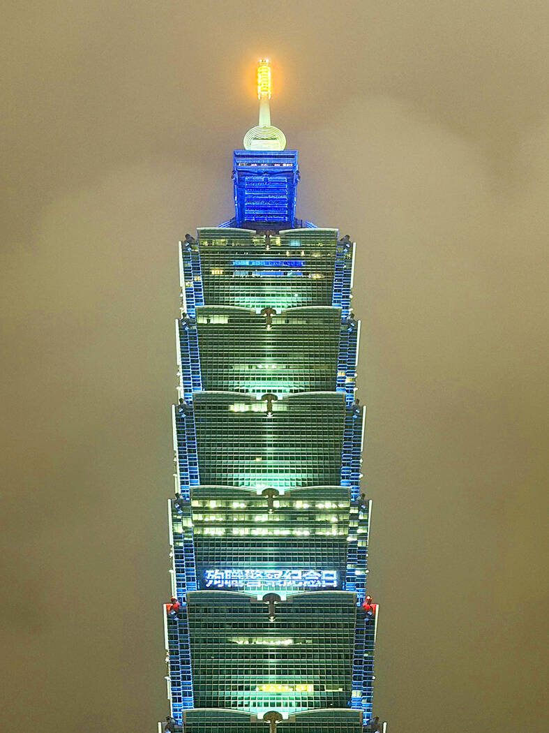 Taipei 101 lights up blue as tribute to fallen police