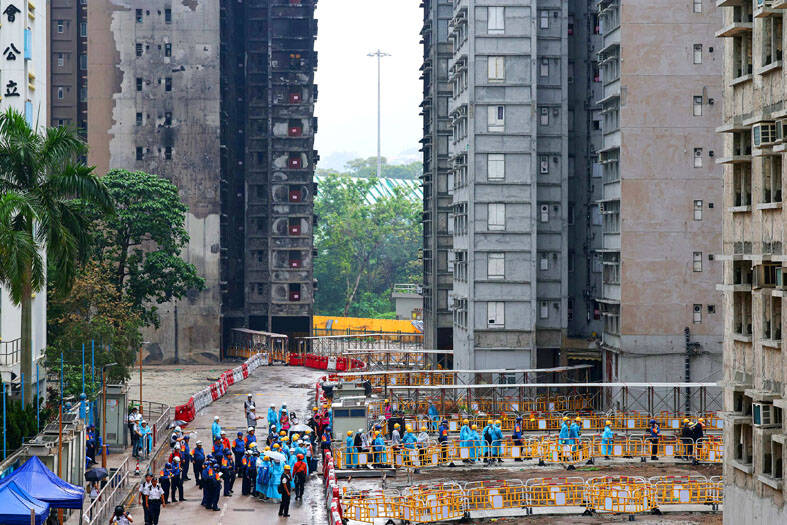 HK victims scour scorched homes for keepsakes