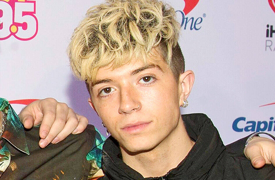 Ex-girlfriend of singer charged