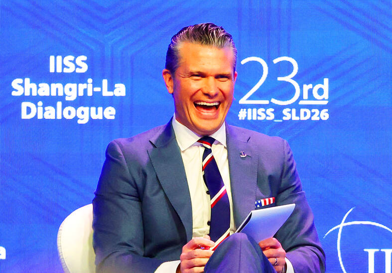 Hegseth tones down China warning at defense forum