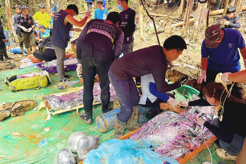 Rescuers safely free four men trapped in Laos cave