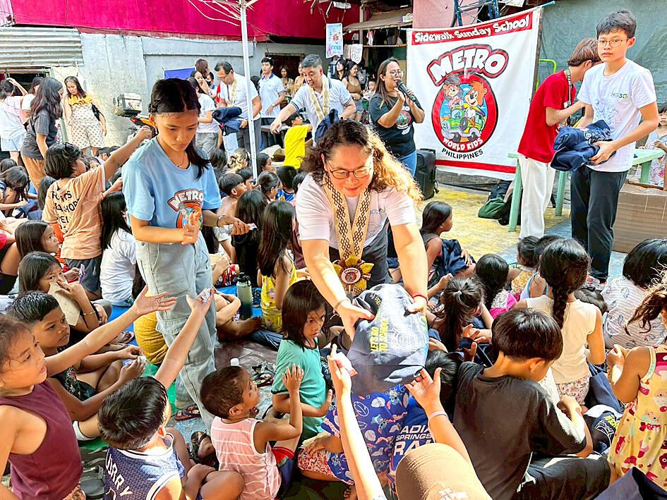Charity donates stationery to Filipino children