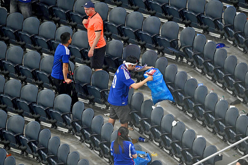 Japan fans garner praise, mockery for cleaning up