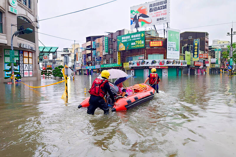 Heavy rains flood Taiwan, leaving at least two dead