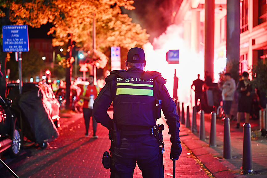 UK police confront Morocco fans over unrest after World Cup loss