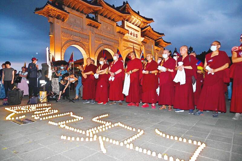 Tibet supporters in Taipei mourn activist, protest China’s ethnic unity law