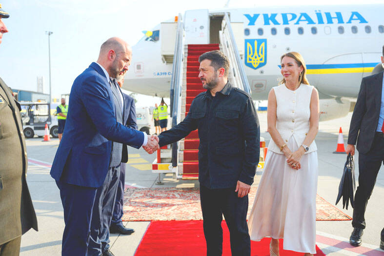 Zelenskiy visits Serbia as Moscow kills four in Kyiv - Taipei Times