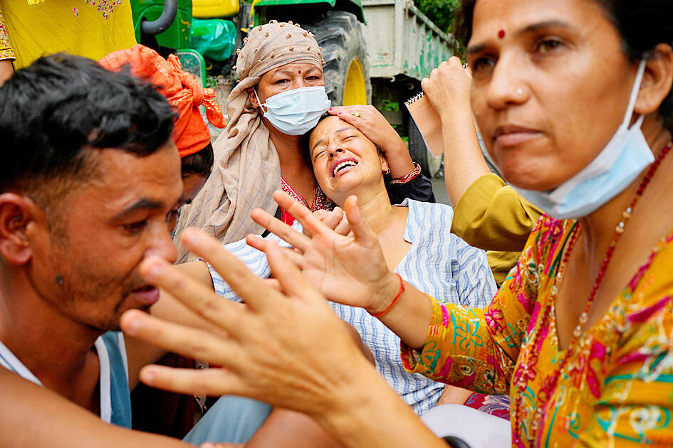 Nepal-Tibet floods death toll exceeds 1,000: officials